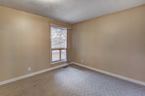 1163 Falworth Road Ne, Calgary, AB - Indoor Photo Showing Other Room