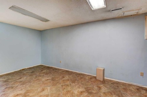 1163 Falworth Road Ne, Calgary, AB - Indoor Photo Showing Other Room