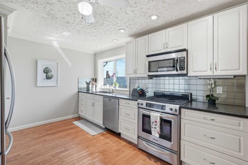 1126 Child Avenue Ne, Calgary, AB - Indoor Photo Showing Kitchen With Stainless Steel Kitchen With Upgraded Kitchen