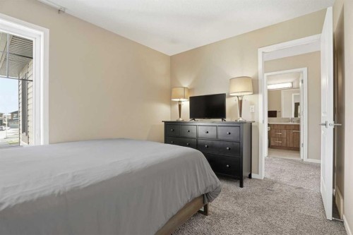 296 Walden Parade Se, Calgary, AB - Indoor Photo Showing Bedroom