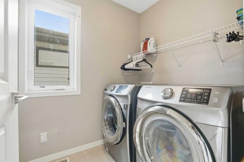 296 Walden Parade Se, Calgary, AB - Indoor Photo Showing Laundry Room