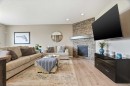 296 Walden Parade Se, Calgary, AB  - Indoor Photo Showing Living Room With Fireplace 