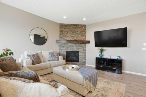 296 Walden Parade Se, Calgary, AB - Indoor Photo Showing Living Room With Fireplace