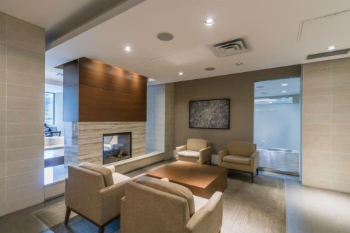 336-222 Riverfront Avenue Sw, Calgary, AB - Indoor With Fireplace
