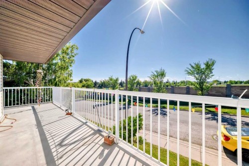 131 Ranchlands Court Nw, Calgary, AB - Outdoor With Deck Patio Veranda With Exterior