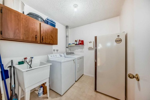 131 Ranchlands Court Nw, Calgary, AB - Indoor Photo Showing Laundry Room