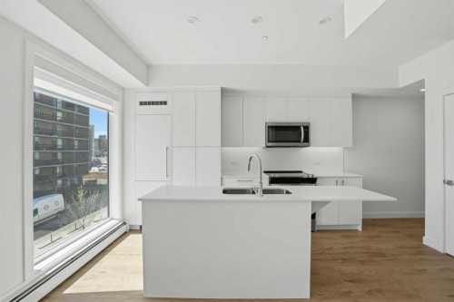 309-310 15 Avenue Sw, Calgary, AB - Indoor Photo Showing Kitchen With Upgraded Kitchen