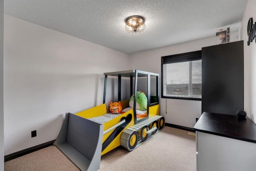 55 Evanspark Circle Nw, Calgary, AB - Indoor Photo Showing Bedroom