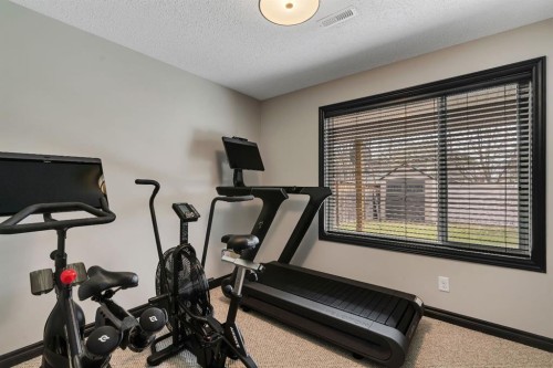 55 Evanspark Circle Nw, Calgary, AB - Indoor Photo Showing Gym Room