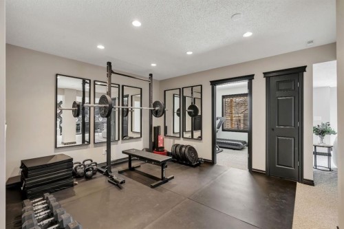 55 Evanspark Circle Nw, Calgary, AB - Indoor Photo Showing Gym Room