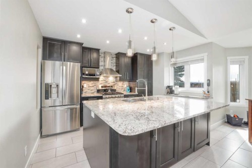 228 Wood Valley Bay Sw, Calgary, AB - Indoor Photo Showing Kitchen With Upgraded Kitchen