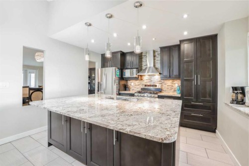 228 Wood Valley Bay Sw, Calgary, AB - Indoor Photo Showing Kitchen With Upgraded Kitchen