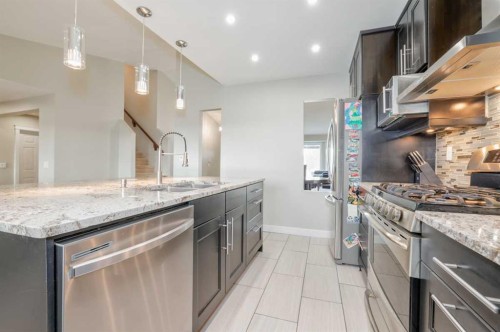 228 Wood Valley Bay Sw, Calgary, AB - Indoor Photo Showing Kitchen With Upgraded Kitchen