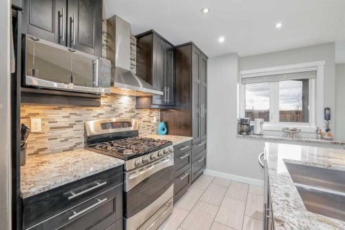 228 Wood Valley Bay Sw, Calgary, AB - Indoor Photo Showing Kitchen With Upgraded Kitchen