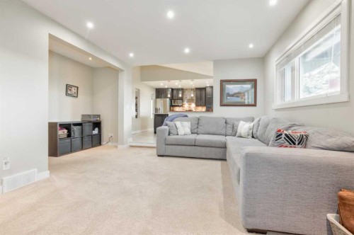 228 Wood Valley Bay Sw, Calgary, AB - Indoor Photo Showing Living Room
