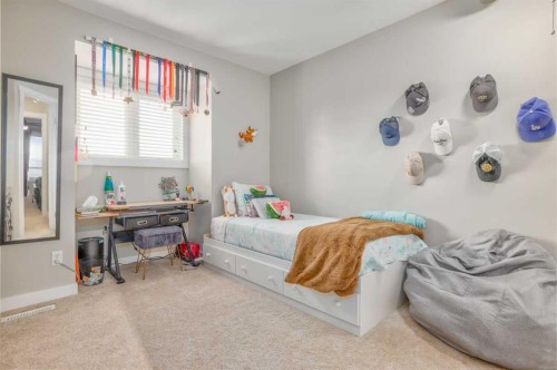228 Wood Valley Bay Sw, Calgary, AB - Indoor Photo Showing Bedroom