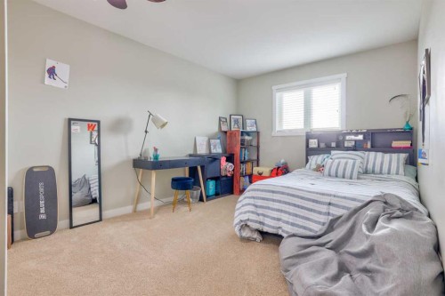 228 Wood Valley Bay Sw, Calgary, AB - Indoor Photo Showing Bedroom