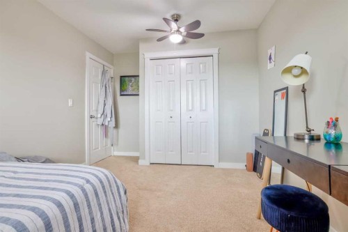 228 Wood Valley Bay Sw, Calgary, AB - Indoor Photo Showing Bedroom