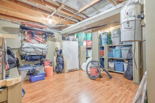 228 Wood Valley Bay Sw, Calgary, AB - Indoor Photo Showing Basement