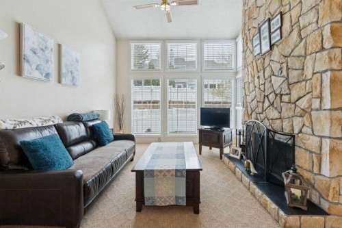 38-28 Berwick Crescent Nw, Calgary, AB - Indoor Photo Showing Living Room With Fireplace