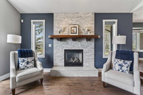 756 East Chestermere Drive, Chestermere, AB - Indoor Photo Showing Living Room With Fireplace