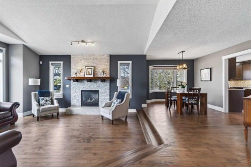 756 East Chestermere Drive, Chestermere, AB - Indoor Photo Showing Living Room With Fireplace