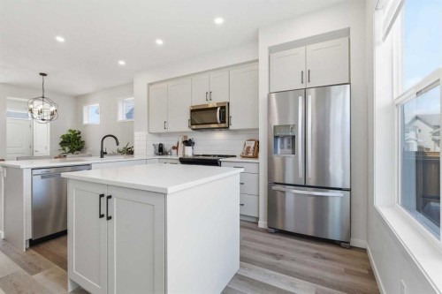 48 Magnolia Parade Se, Calgary, AB - Indoor Photo Showing Kitchen With Upgraded Kitchen