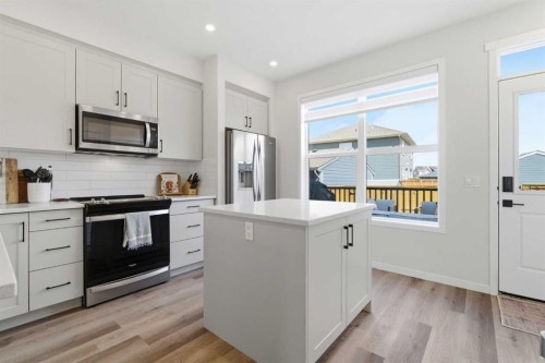 48 Magnolia Parade Se, Calgary, AB - Indoor Photo Showing Kitchen With Upgraded Kitchen