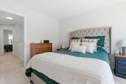 48 Magnolia Parade Se, Calgary, AB - Indoor Photo Showing Bedroom