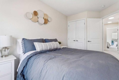 48 Magnolia Parade Se, Calgary, AB - Indoor Photo Showing Bedroom