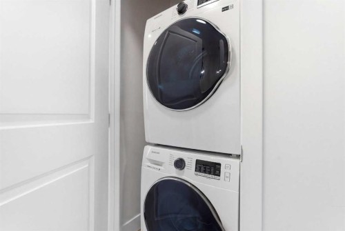 48 Magnolia Parade Se, Calgary, AB - Indoor Photo Showing Laundry Room