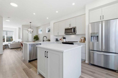 48 Magnolia Parade Se, Calgary, AB - Indoor Photo Showing Kitchen With Upgraded Kitchen