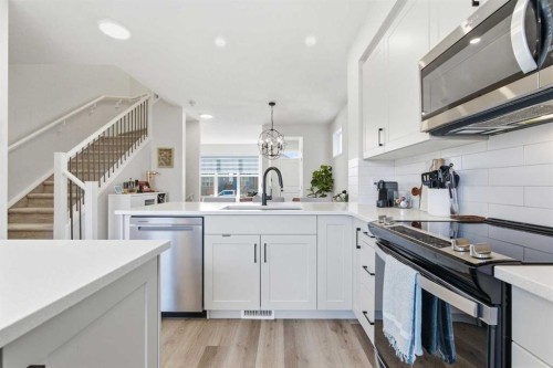 48 Magnolia Parade Se, Calgary, AB - Indoor Photo Showing Kitchen With Upgraded Kitchen