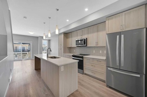 1132 Sage Hill Grove Nw, Calgary, AB - Indoor Photo Showing Kitchen With Stainless Steel Kitchen With Double Sink With Upgraded Kitchen
