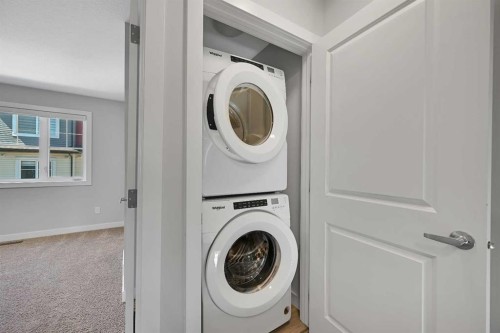 1132 Sage Hill Grove Nw, Calgary, AB - Indoor Photo Showing Laundry Room