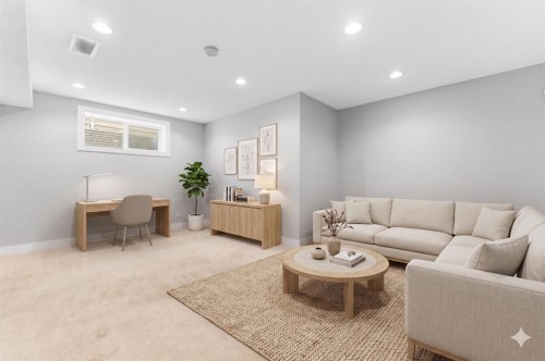 25 Everridge Way Sw, Calgary, AB - Indoor Photo Showing Living Room