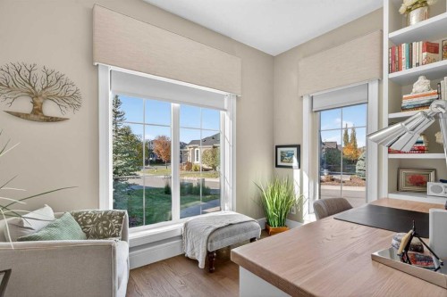56 Cranbrook Landing Se, Calgary, AB - Indoor Photo Showing Living Room With Fireplace