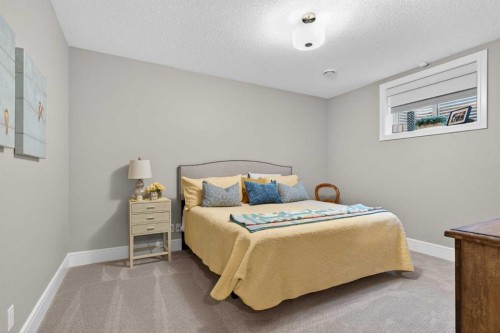 56 Cranbrook Landing Se, Calgary, AB - Indoor Photo Showing Bedroom