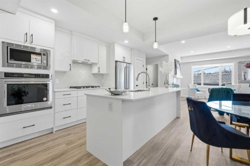 2-2635 1 Avenue Nw, Calgary, AB - Indoor Photo Showing Kitchen With Upgraded Kitchen