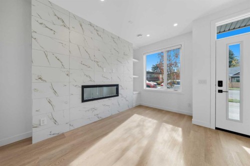 1224 20 Avenue Nw, Calgary, AB - Indoor With Fireplace