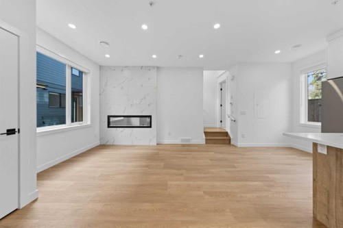 1224 20 Avenue Nw, Calgary, AB - Indoor With Fireplace