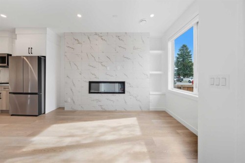 1224 20 Avenue Nw, Calgary, AB - Indoor With Fireplace