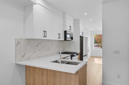1224 20 Avenue Nw, Calgary, AB - Indoor Photo Showing Kitchen With Double Sink With Upgraded Kitchen