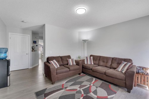 257 Saddlebrook Point Ne, Calgary, AB - Indoor Photo Showing Living Room