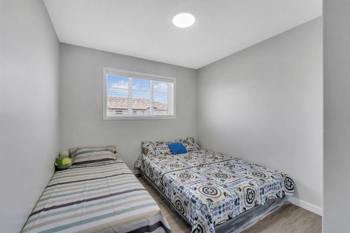 257 Saddlebrook Point Ne, Calgary, AB - Indoor Photo Showing Bedroom