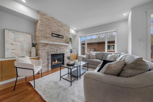 1010 19 Avenue Se, Calgary, AB - Indoor Photo Showing Living Room With Fireplace