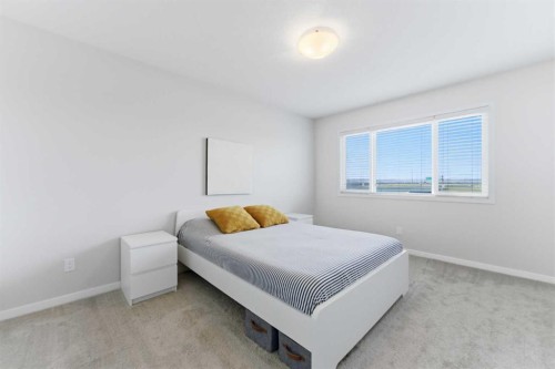 912 Seton Circle Se, Calgary, AB - Indoor Photo Showing Bedroom