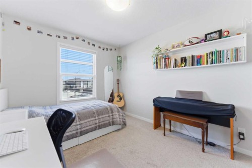912 Seton Circle Se, Calgary, AB - Indoor Photo Showing Bedroom