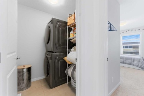 912 Seton Circle Se, Calgary, AB - Indoor Photo Showing Laundry Room
