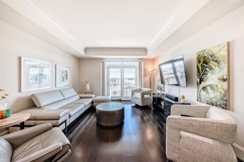 404-211 Quarry Way Se, Calgary, AB - Indoor Photo Showing Living Room